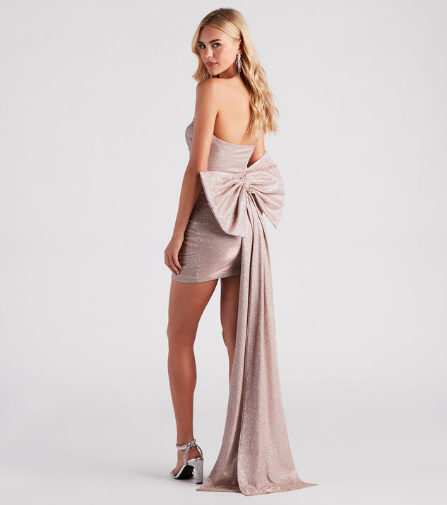 The Marcy Glitter Bow Mini Party Dress is a mini dress that will make a statement with its short hemline and on-trend details to have you ready for any event!