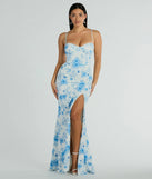 The Elia High Slit Floral Crepe Mermaid Dress is an essential holiday or NYE dress that pairs chic style with versatility making it perfect for cocktail events, New Year's Eve parties, or as a winter wedding guest look.