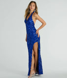 You'll be the best dressed in the Analia Halter Slit Mermaid Sequin Formal Dress as your fall formal dress with beautiful and unique details from Windsor.