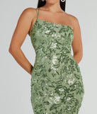 The Meredith One-Shoulder Sequin Formal Dress is a dazzling sage sequin dress, perfect for making a bold entrance at any event, from cocktail parties to formal celebrations.