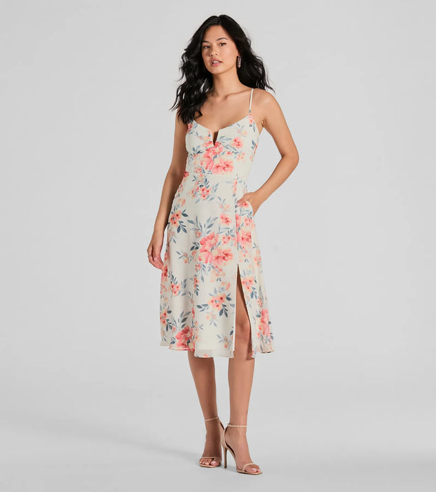 Essential for vacations or summer days, the Floral Energy Sleeveless A-Line Chiffon Midi Dress is a sundress or milkmaid dress with sleek and flirty details.