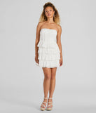 Essential for vacations or summer days, the Sweetest Sight Strapless Ruffled Eyelet Mini Dress is a sundress or milkmaid dress with sleek and flirty details.