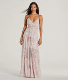 Essential for vacations or summer days, the Exceptional Bliss Lace-Up Floral Chiffon Maxi Dress is a sundress or milkmaid dress with sleek and flirty details.