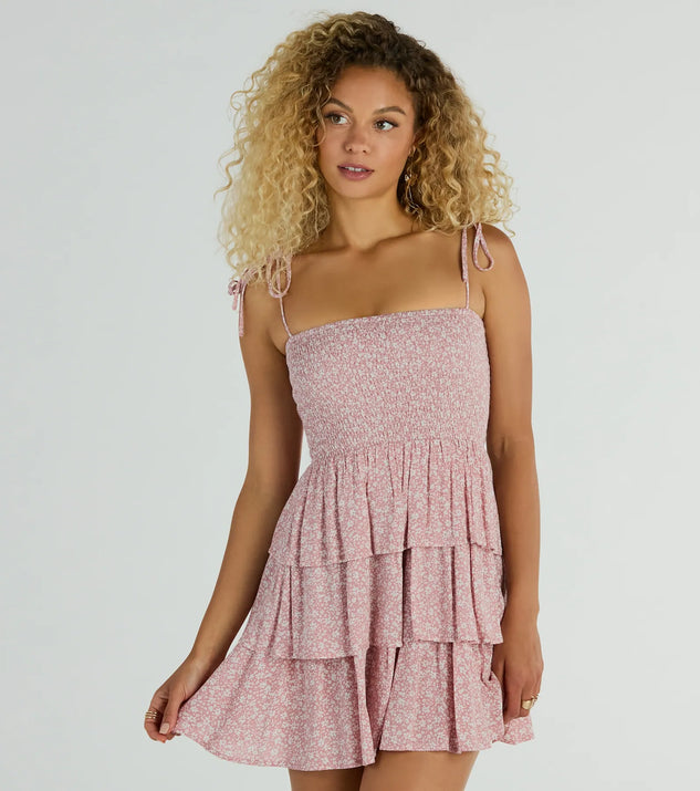 Essential for vacations or summer days, the Flirty Day Ruffled Ditsy Floral Skater Dress is a sundress or milkmaid dress with sleek and flirty details.