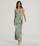 Essential for vacations or summer days, the Fabulous Destination Tropical Cowl Neck Maxi Dress is a sundress or milkmaid dress with sleek and flirty details.