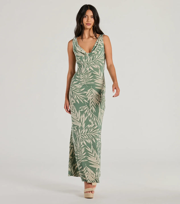 Essential for vacations or summer days, the Fabulous Destination Tropical Cowl Neck Maxi Dress is a sundress or milkmaid dress with sleek and flirty details.