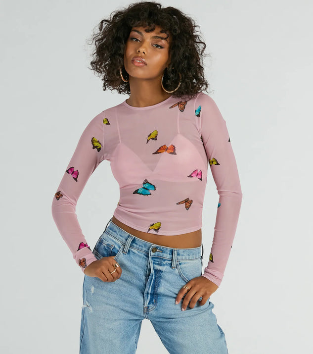 Whether fitted or flowy, the Butterfly Effect Long Sleeve Mesh Crop Top is a long-sleeve top that offers endless styling options as a layer or a standalone piece to elevate your outfit for the season.