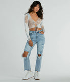 The crop top style of the Tie Dye Cutie Lace-Up Long Sleeve Crop Top adds a sultry detail to your going-out outfits or everyday looks.