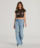 The Born Star Rhinestone Sheer Mesh Crop Top is a short-sleeve top that is cool enough for warm weather and provides a stylish layer to create a trendsetting look.