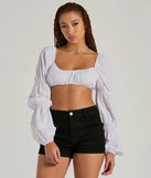 Whether fitted or flowy, the Official Cutie Tie Back Long Sleeve Crop Top is a long-sleeve top that offers endless styling options as a layer or a standalone piece to elevate your outfit for the season.