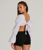 Whether fitted or flowy, the Official Cutie Tie Back Long Sleeve Crop Top is a long-sleeve top that offers endless styling options as a layer or a standalone piece to elevate your outfit for the season.