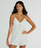 The Sweet Aura Sleeveless Sweetheart Eyelet Romper is an elevated one-piece that blends sleek sophistication with playful charm, perfect for nailing casual or formal outfits.