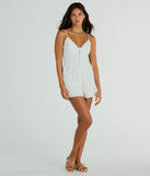 The Sweet Aura Sleeveless Sweetheart Eyelet Romper is an elevated one-piece that blends sleek sophistication with playful charm, perfect for nailing casual or formal outfits.