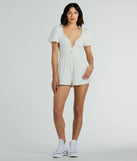 The One Take Puff Sleeve V-Neck Linen Romper is an elevated one-piece that blends sleek sophistication with playful charm, perfect for nailing casual or formal outfits.