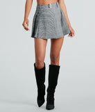 The mini skirt length on the Classic Look Plaid Pleated Woven Skort adds a sultry detail to your going-out outfits or everyday looks.