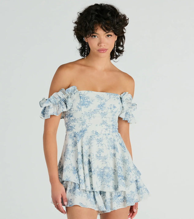 The Pretty Girl Ruffled Off-The-Shoulder Scenic Print Romper is an elevated one-piece that blends sleek sophistication with playful charm, perfect for nailing casual or formal outfits.