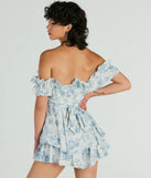 The Pretty Girl Ruffled Off-The-Shoulder Scenic Print Romper is an elevated one-piece that blends sleek sophistication with playful charm, perfect for nailing casual or formal outfits.