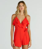 The Chic Season Ruffled Wrap-Front Woven Romper is an elevated one-piece that blends sleek sophistication with playful charm, perfect for nailing casual or formal outfits.