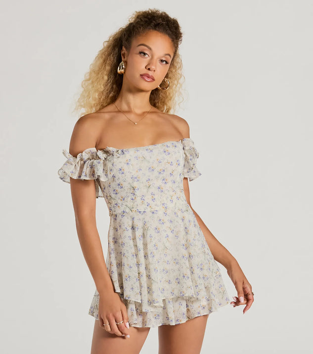 The Fun And Flirty Off-The-Shoulder Ruffled Floral Romper is an elevated one-piece that blends sleek sophistication with playful charm, perfect for nailing casual or formal outfits.