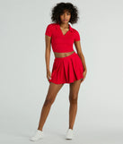 The Game Set High Rise Pleated Mini Skort offers a discreetly comfy fit with shorts under a stylish skirt overlay featuring the latest accents and details.