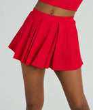 The Game Set High Rise Pleated Mini Skort offers a discreetly comfy fit with shorts under a stylish skirt overlay featuring the latest accents and details.