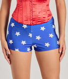 Close-up of star print hot shorts emphasizing the smooth fabric and slim fit.