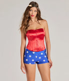 Front view of star print hot shorts showcasing high-waisted fit and silver star pattern styled as a comic book hero costume for women.