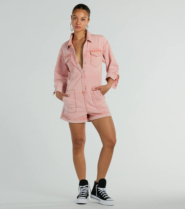 The Road Trippin' Long Sleeve Cuffed Acid Denim Romper is an elevated one-piece that blends sleek sophistication with playful charm, perfect for nailing casual or formal outfits.