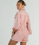 The Road Trippin' Long Sleeve Cuffed Acid Denim Romper is an elevated one-piece that blends sleek sophistication with playful charm, perfect for nailing casual or formal outfits.