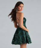 You'll be the best dressed in the Joanna Sequin Lace Party Dress as your fall formal dress with unique details from Windsor.