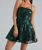 You'll be the best dressed in the Joanna Sequin Lace Party Dress as your fall formal dress with unique details from Windsor.