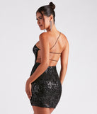 You'll be the best dressed in the Kai Formal One-Shoulder Sequin Short Dress as your summer formal dress with unique details from Windsor.