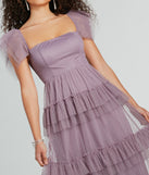 You'll be the best dressed in the Arylee Polka Dot A-Line Ruffle Tulle Formal Dress as your summer formal dress with unique details from Windsor.