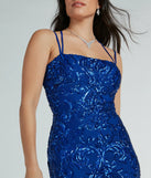 You'll be the best dressed in the Delaney Lace-Up Mermaid Sequin Formal Dress as your summer formal dress with unique details from Windsor.