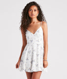 Essential for vacations or summer days, the Can't Resist Chiffon Floral Skater Dress is a sundress or milkmaid dress with sleek and flirty details.