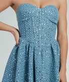 Essential for vacations or summer days, the So Flirty Strapless Sequin Glitter Denim Skater Dress is a sundress or milkmaid dress with sleek and flirty details.