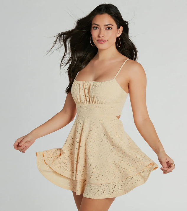 Essential for vacations or summer days, the Simply Sunny Scoop Neck Skater Eyelet Mini Dress is a sundress or milkmaid dress with sleek and flirty details.