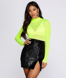Dress up in Bright Nights Neon Bodysuit as your going-out dress for holiday parties, an outfit for NYE, party dress for a girls’ night out, or a going-out outfit for any seasonal event!