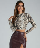 With fun and flirty details, Sassy Brushed Knit Snake Crop Top shows off your unique style for a trendy outfit for the summer season!