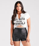 Essential for your seasonal closet, the Save Water Drink Tequila Graphic Crop Tee offers a trendy twist on everyday tops so you can elevate your style effortlessly.