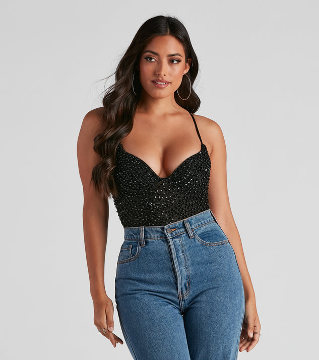 The tucked-in look of the Twisted Angel Embroidered Bodysuit creates a polished look and with fab details brings a distinct style to your outfit.