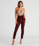 Refresh your fall closet with stylish women's pants like the High Waist Paperbag Skinny Dress Pants in a sleek fabric and a pant leg style that makes your look unique.