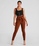 Refresh your fall closet with stylish women's pants like the High Waist Paperbag Skinny Dress Pants in a sleek fabric and a pant leg style that makes your look unique.