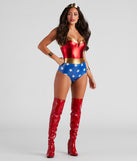 Women's Lady Justice Costume from Windsor styled with an iconic hero's gold crown headband, gold arm cuff bracelets, red latex thigh-high boots, & a red, white and blue bodysuit with gold trim